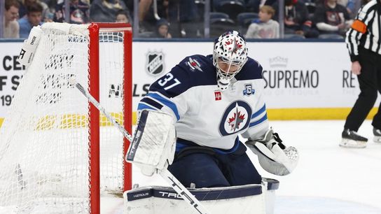 Report: Multiple teams in mix to acquire Jets G Connor Hellebuyck (NHL). Photo by Russell LaBounty