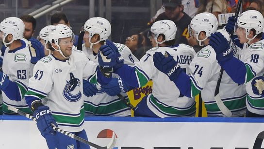 Canucks blow late lead, pull out opening win over Oilers in overtime (NHL). Photo by Perry Nelson