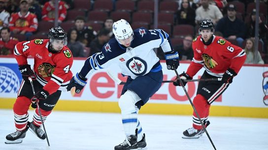 Blackhawks hold on for overtime win despite Jets' comeback (NHL). Photo by Matt Marton
